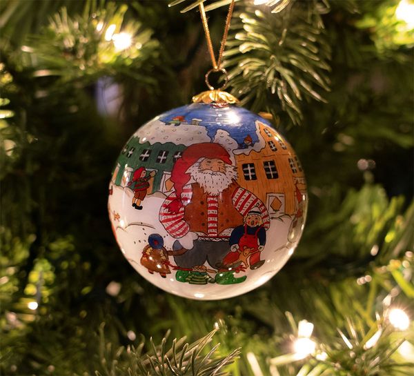 Main Image Glass bauble, Santa and the children play in the ...